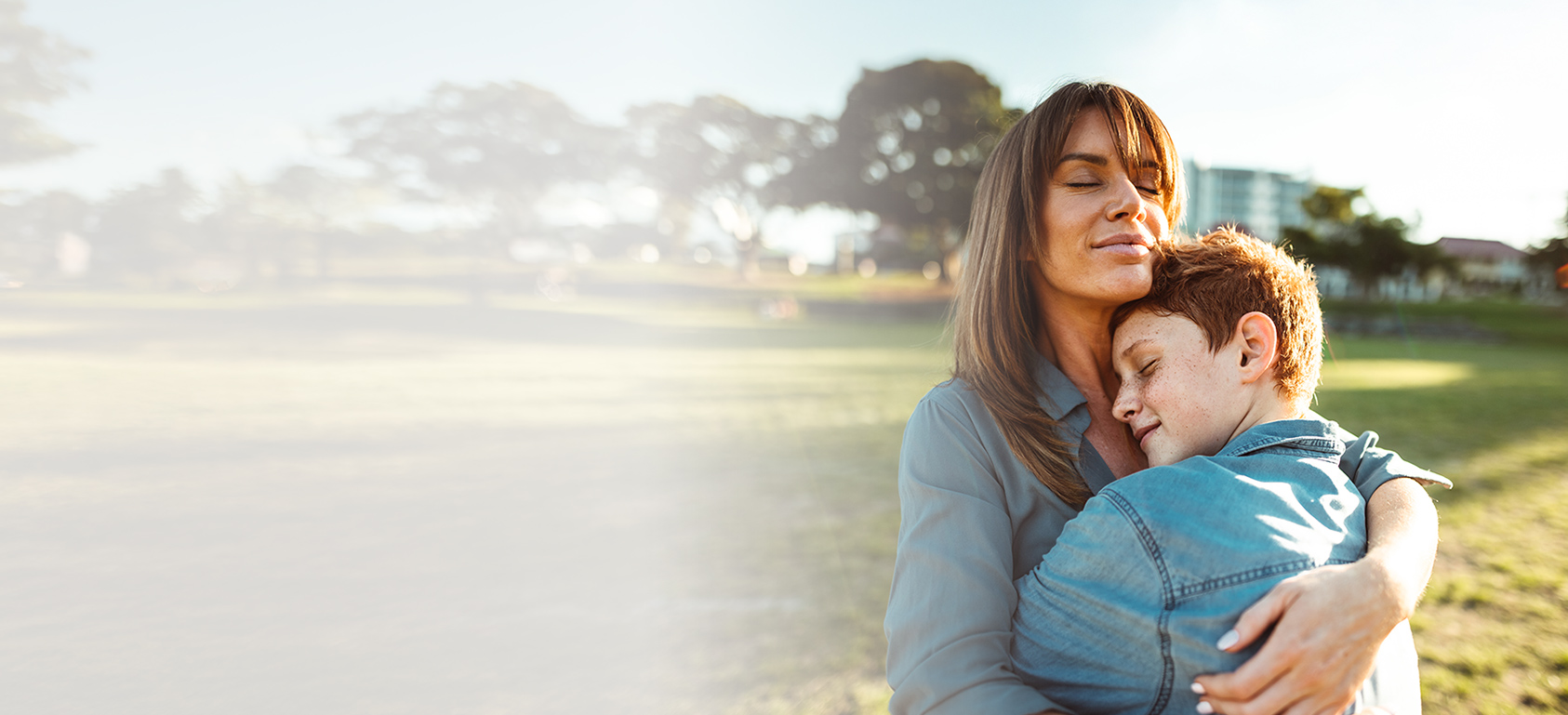 mother hugging child